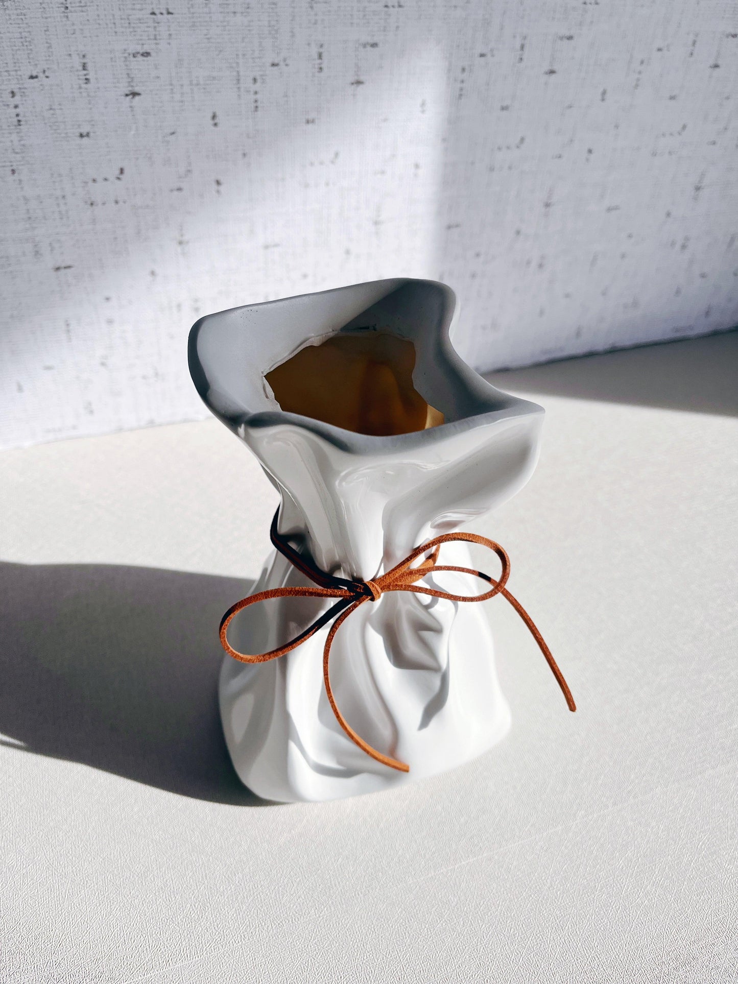 Ivory Vase with faux leather bow