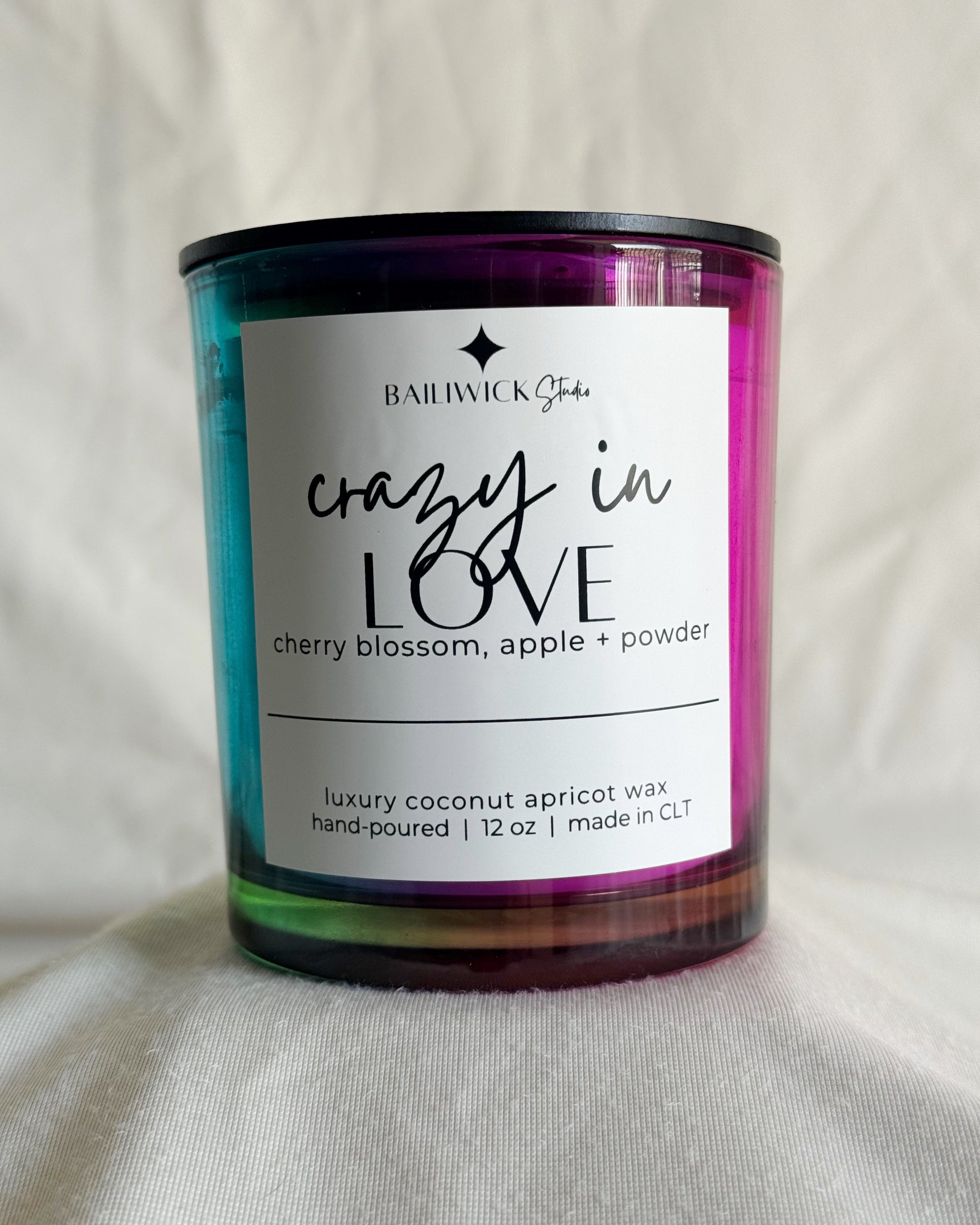 Candle with a label on a white background