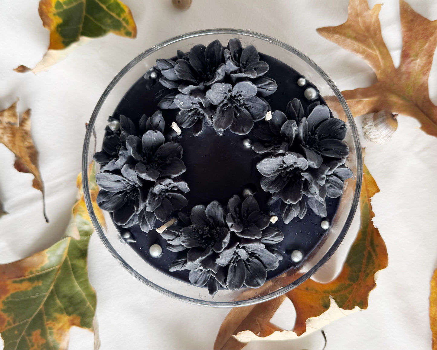 “Moody Merriment” black decorative candle