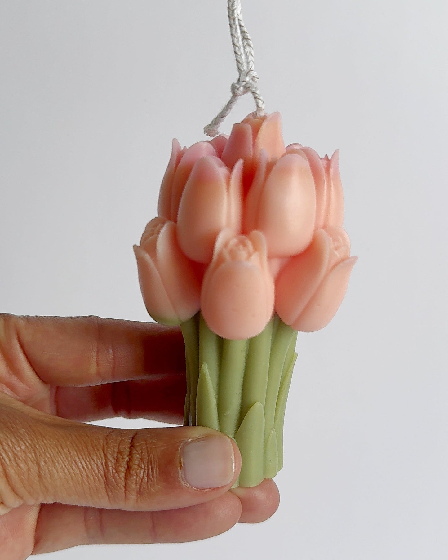 Pink tulip-shaped candle 