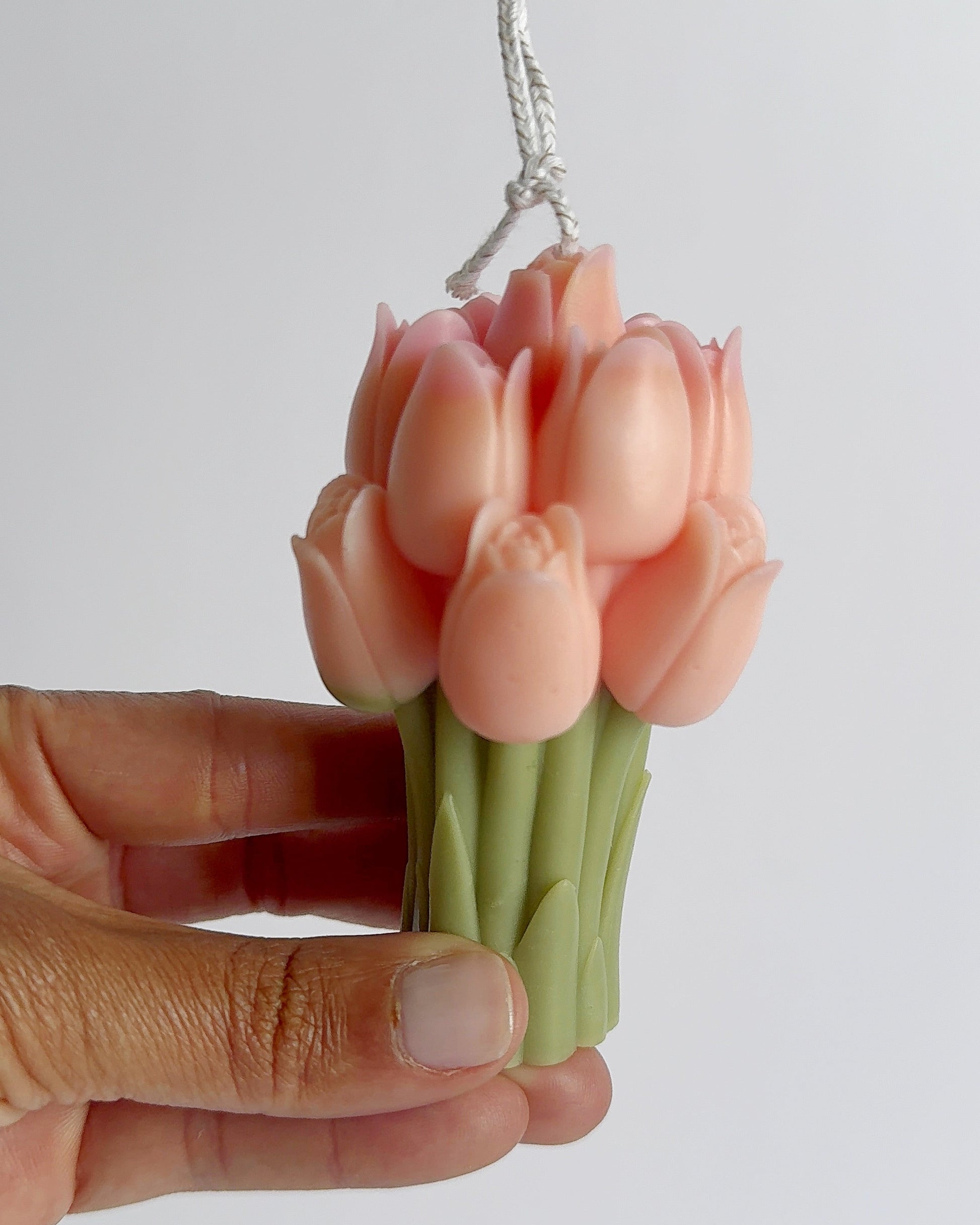 Pink tulip-shaped candle 