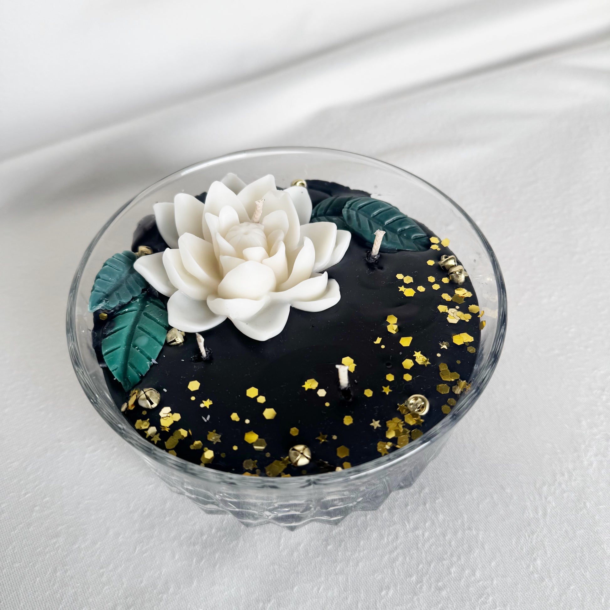 black decorative candle holiday christmas white flowers