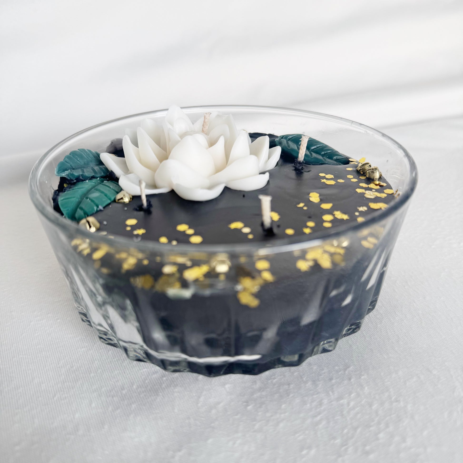 black decorative candle holiday christmas white flowers