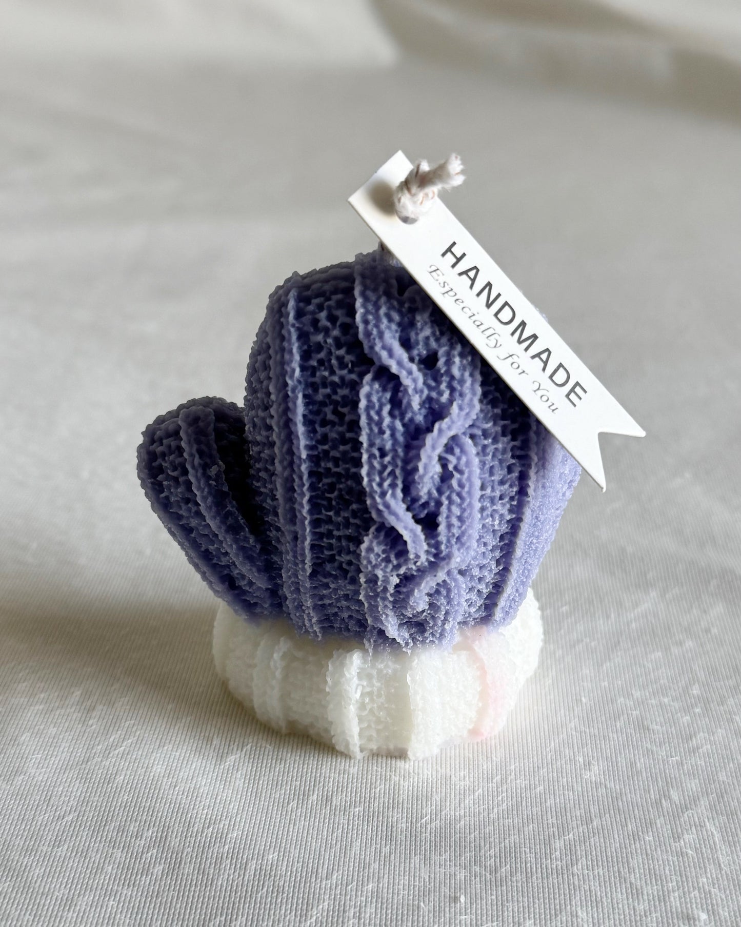 cozy knitted mitten candle