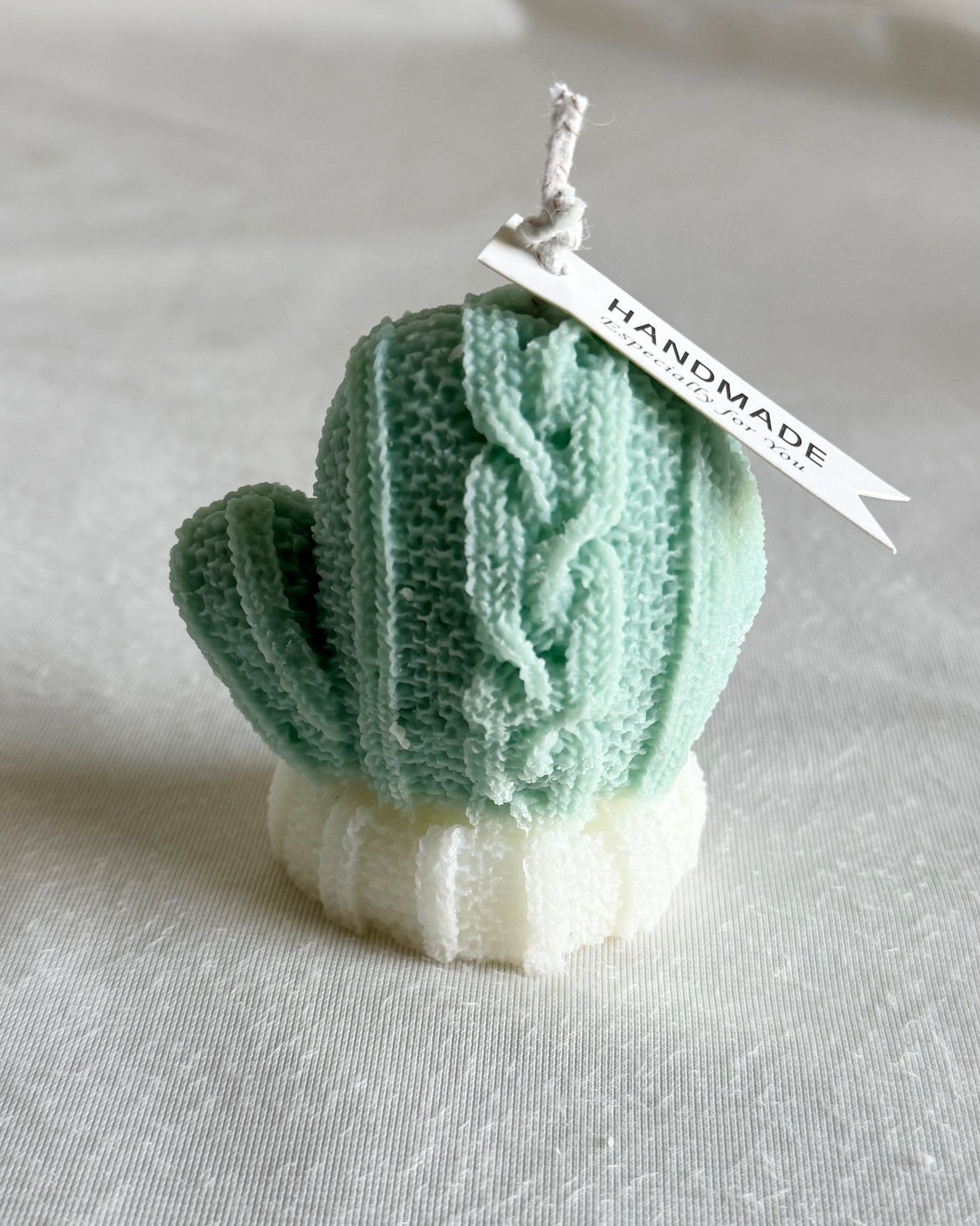 cozy knitted mitten candle