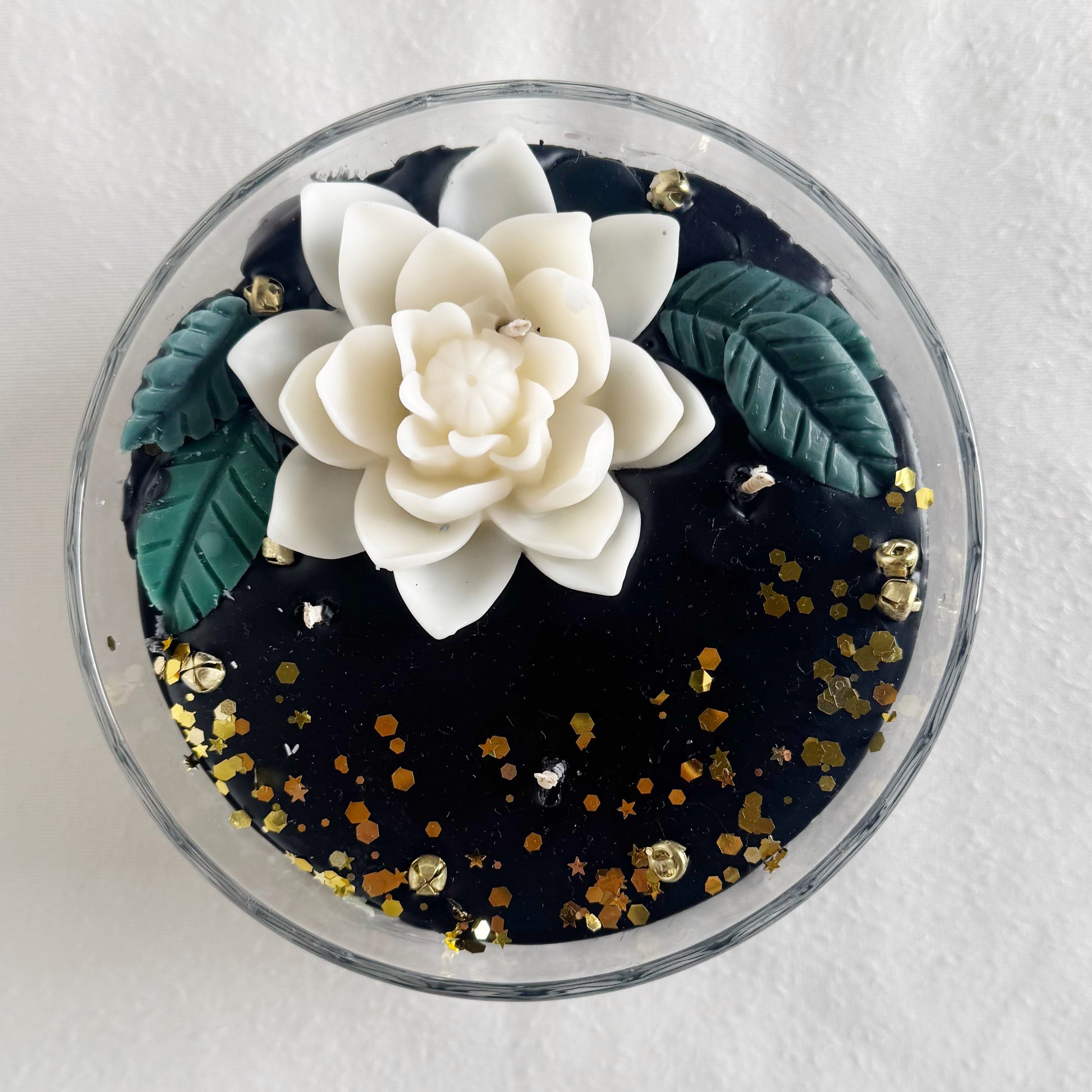 black decorative candle holiday  white flowers