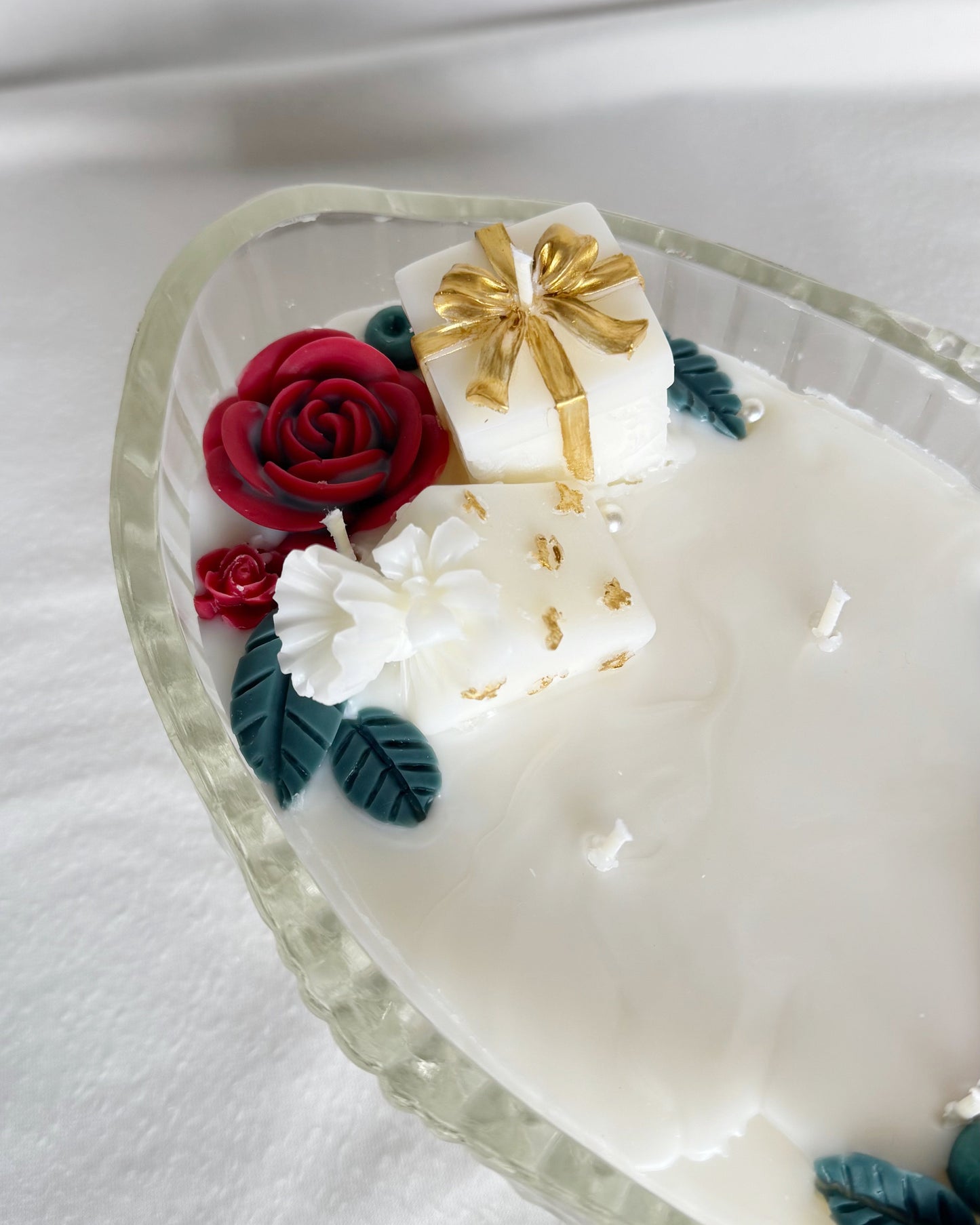 presents and red flowers peppermint mocha christmas candle decorative candle